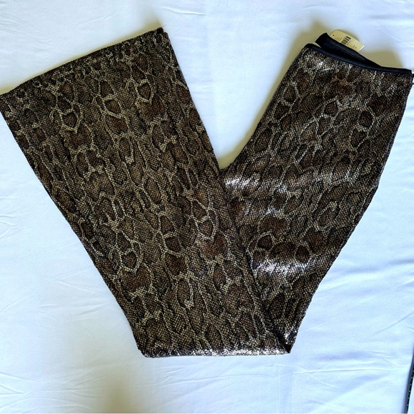 Anthropologie Pants - Anthropologie size 4 snake pants flare so cute NWT